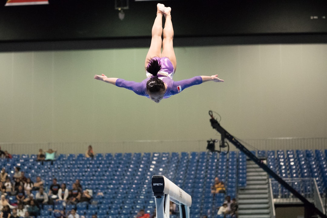 gymnas-jumping-near-the-white-board-powltfp-q30